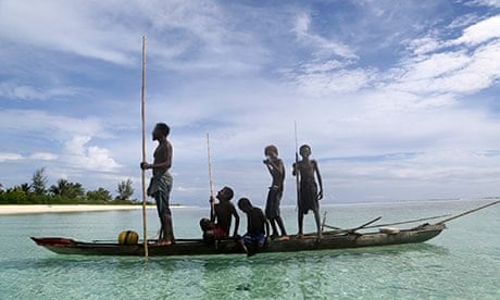 A family fishing on Tsoilik island, Papua New Guinea.