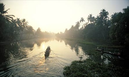 Canoeists on one of Kerala's canals