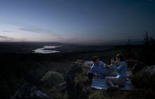 small steel thermos bottle and hot tea on a rock during cold season hiking  Stock Photo - Alamy