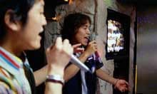 Singing at karaoke bar