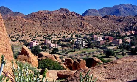 The Moroccan town of Tafroute sits in a bowl between rocky outcrops