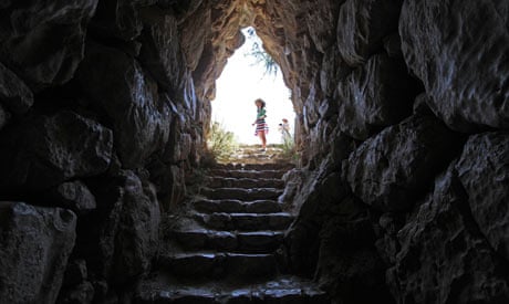 Maddy at the entrance to the secret tunnel in Mycenae.