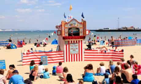 Punch and Judy on the beach at Weymouth, Dorset