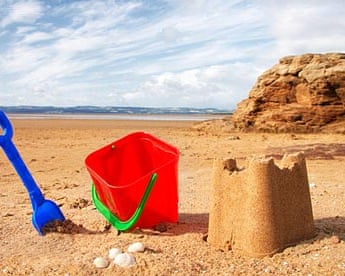 Sandcastle on a beach in summer