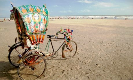A rickshaw on a beach in Bangladesh
