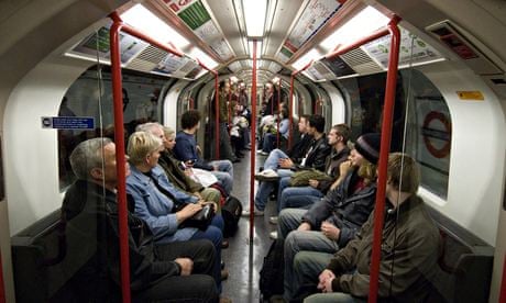 Passengers sitting on London underground tube train