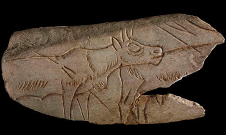 Fragment of decorated reindeer metatarsal
