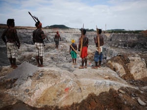 Members of an Amazonian tribe occupy the construction site of the Belo Monte hydroelectric dam