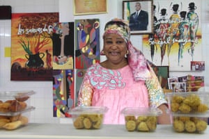 Madame Absa at her stall in the Marché des Batignolles, Paris.