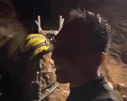 Rescuers celebrate after five people found alive in Laos cave – video
