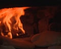 Palestinians in Gaza baking with firewood