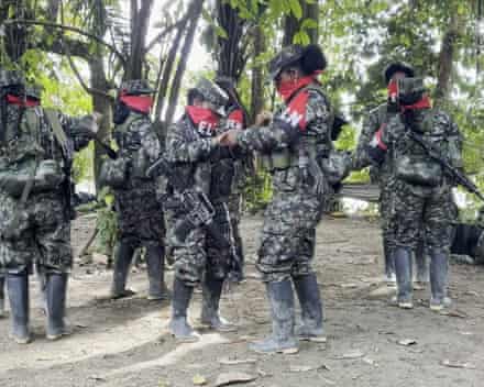 National Liberation Army (ELN) dance during a break from training