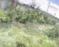 An excerpt of footage from a drone following a Russian soldier into woodland