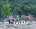 Residents try to salvage belongings from their damaged homes
