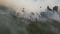 An aerial view shows a fire burning in Sungai Putri village