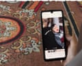 Alaa watches videos of her three children, who were killed in an air strike