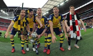 Arsenal players celebrate after their FA Cup final victory over Aston Villa.