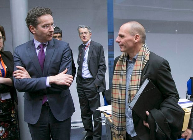 Eurogroup President Jeroen Dijsselbloem (L) looks at Greek Finance Minister Yanis Varoufakis (R) during an extraordinary euro zone Finance Ministers meeting to discuss Athens’ plans to reverse austerity measures agreed as part of its bailout, in Brussels February 11, 2015.