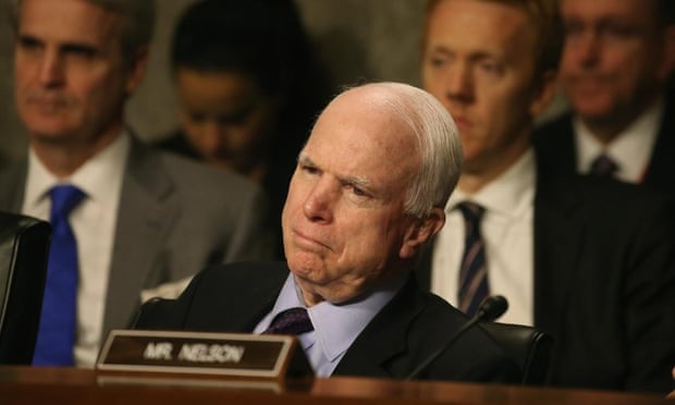 John McCain mocks Obama for calling climate change a threat as Isis advances