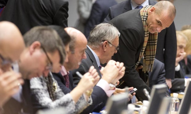 Varoufakis takes his seat during the meeting of eurogroup finance ministers.