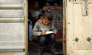 A girl in a Roma camp in Triel-sur-Seine, near Paris