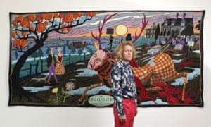 Grayson Perry in front of his The Upper Class at Bay, 2012 .