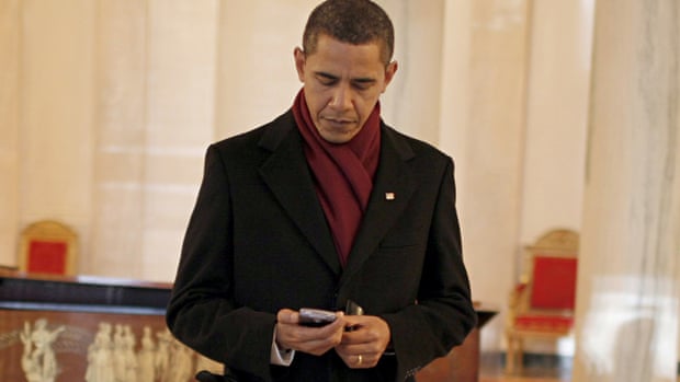 Obama on his BlackBerry