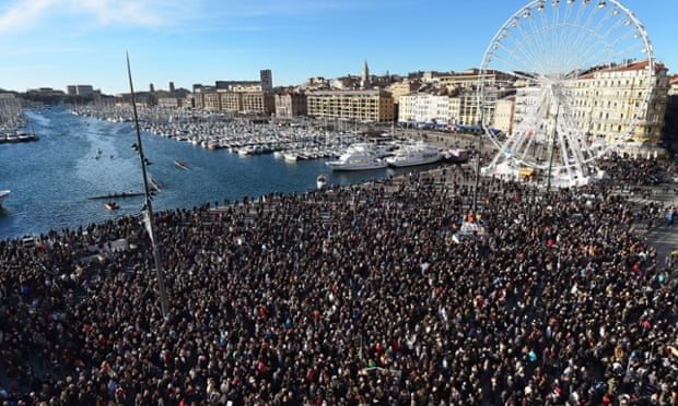 People march during a demonstration attended by an estimated 45,000 on the old harbour in Marseille, southern France.
