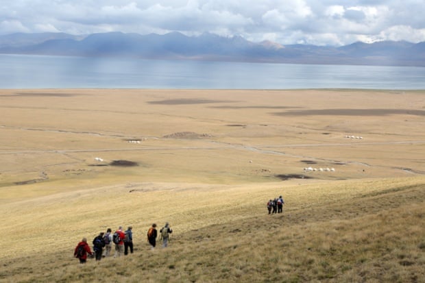 Kevin's group walking above Son Kul Lake.