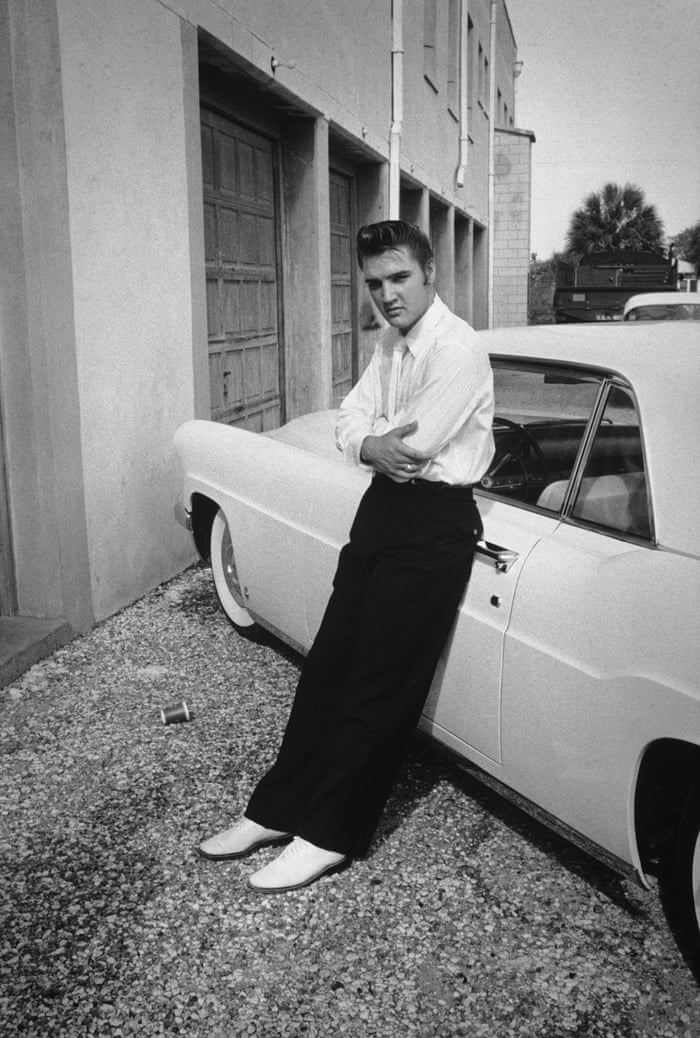Elvis and his 1956 Lincoln car