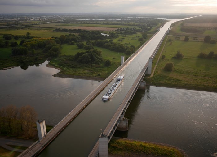 Magdeburg, Germany: A barge chugs along the Magdeburg Water Bridge. The canal aqueduct passes over the Elbe river in the east of Germany.